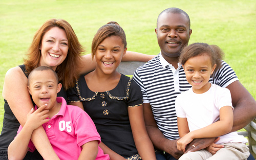 Diverse family portrait outside